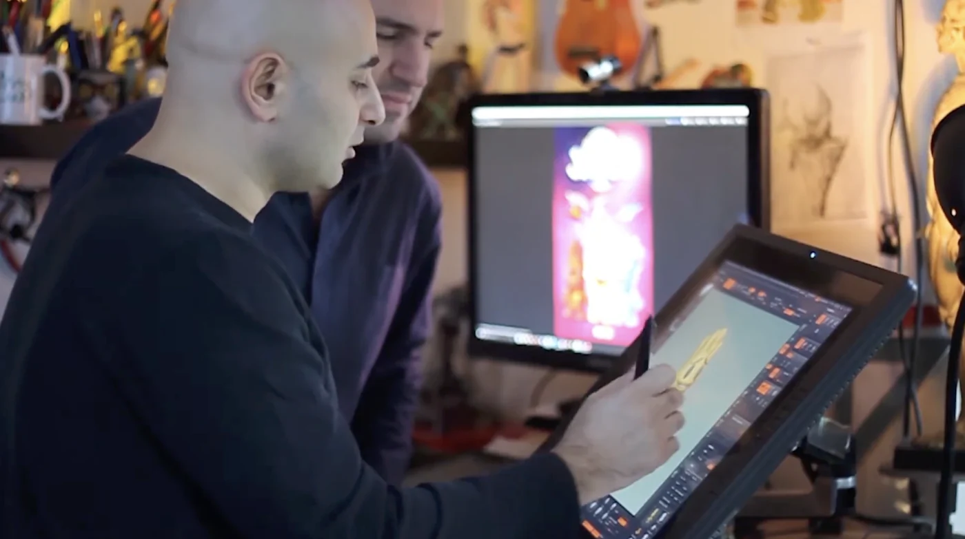 Cemre Ozkurt working on Jixies character artwork at a drawing tablet